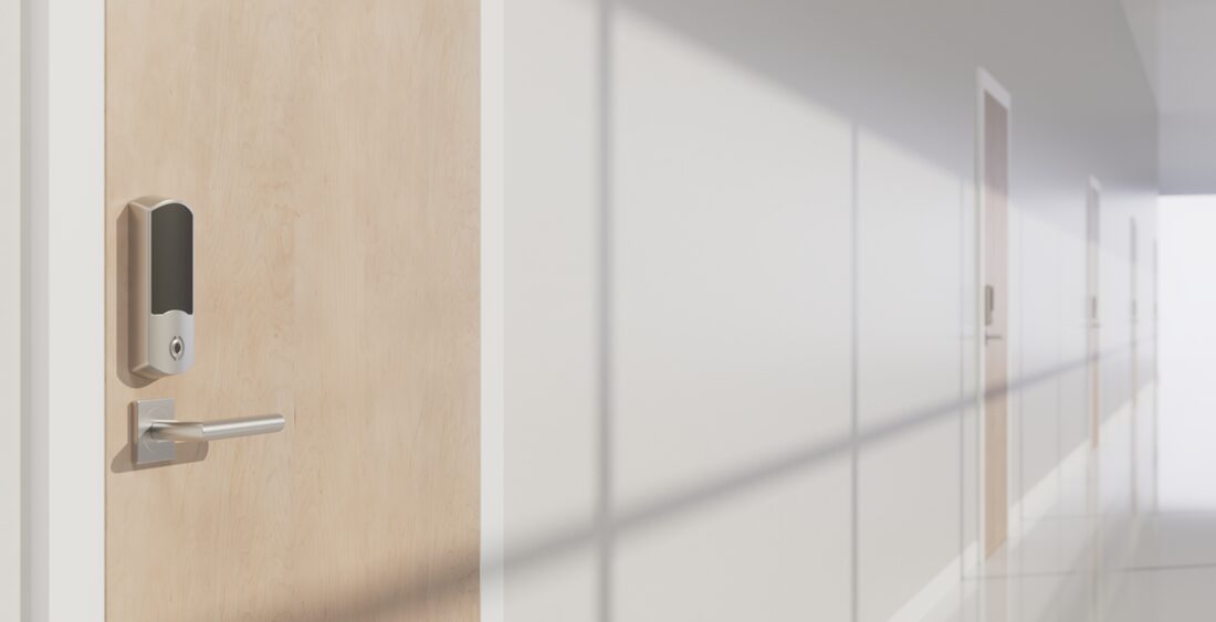 A classroom door on a school corridor fitted with a wireless lock
